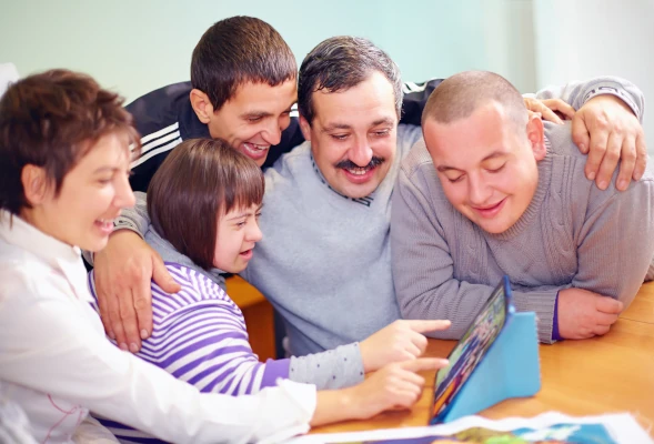 group of disabled people using computer resized